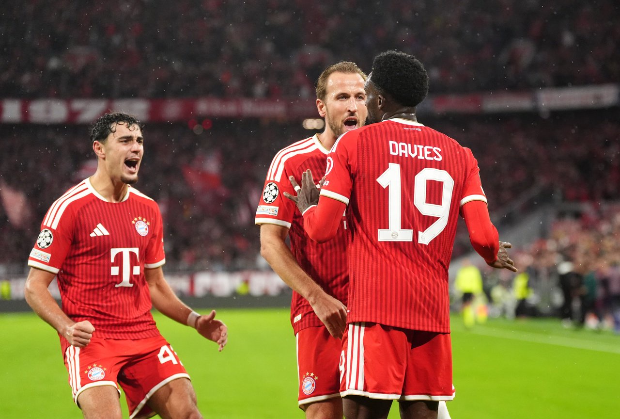 Bayern Munich's Alphonso Davies celebrates scoring their side's first goal of the game with team-mate Harry Kane during the UEFA Champions League match at the Allianz Arena, Munich. Picture date: Wednesday October 21, 2026. (Photo by Adam Davy/PA Images via Getty Images)