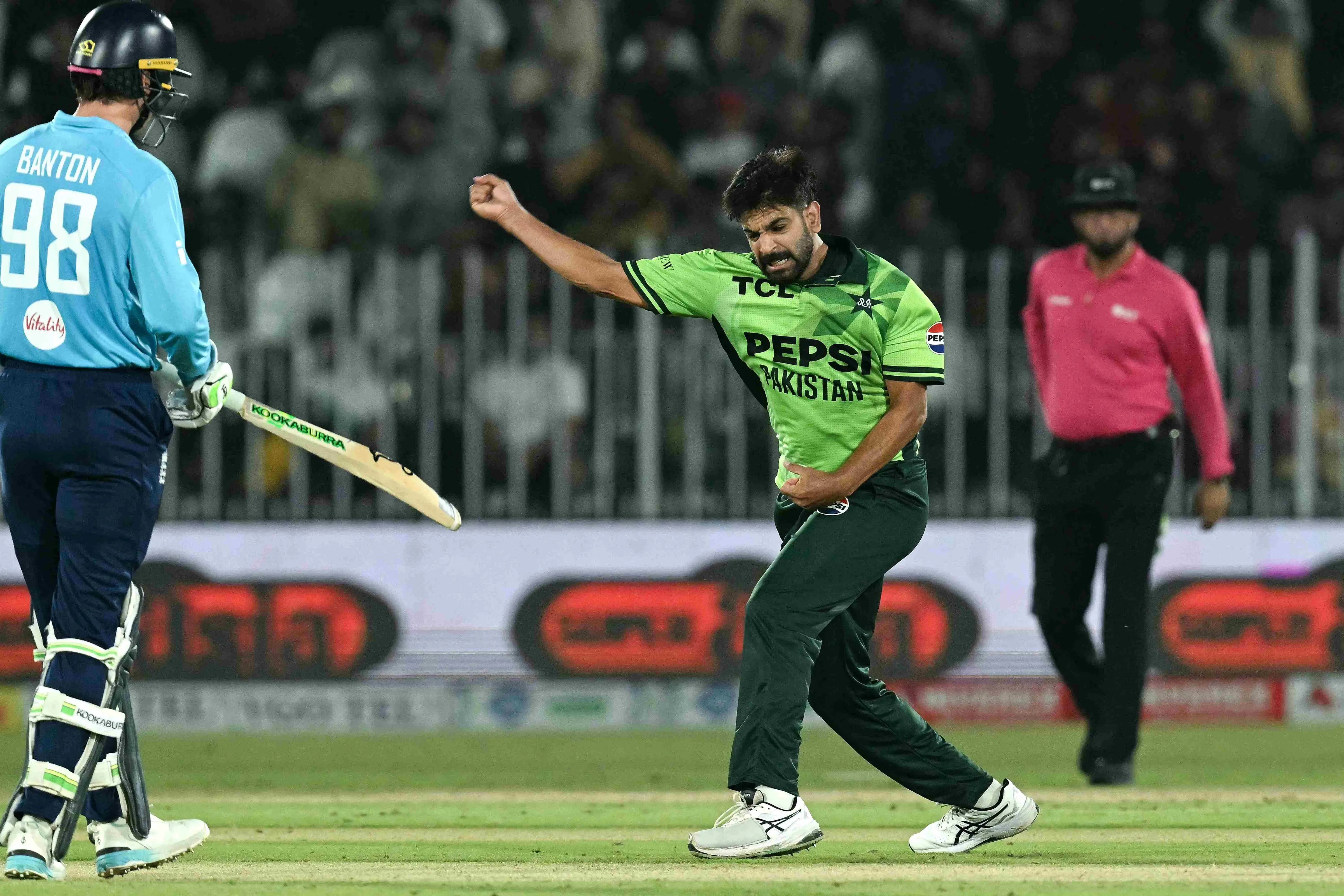 Pakistan's Haris Rauf (C) celebrates after taking the wicket of England's Ben Duckett during the one-day international (ODI) tri-series cricket match between Pakistan and England at the Rawalpindi Cricket Stadium in Rawalpindi on October 20, 2026.