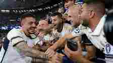 Joselu celebrates with the Real Madrid fans