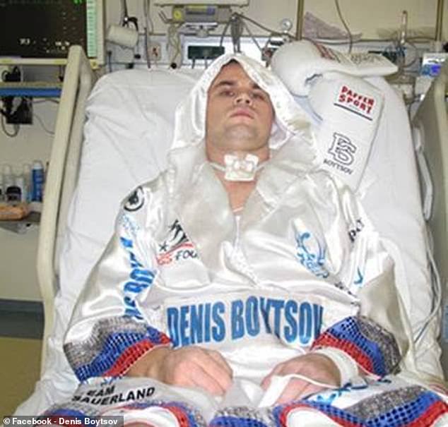 Boystov is pictured in his boxing gear in hospital after the 'attack' on him in 2015