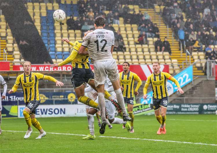 Frankie Hvid heads home Maidstone's 84th-minute equaliser at Torquay. Picture: Helen Cooper