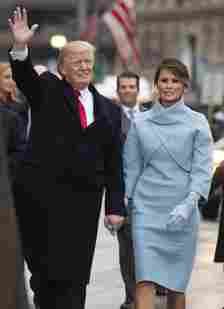 WASHINGTON, DC - JANUARY 20: President Donald Trump and first lady Melania Trump walk in their inaugural parade on January 20, 2017 in Washington, DC. Donald Trump was sworn-in as the 45th President of the United States. (Photo by Kevin Dietsch - Pool/Getty Images)
