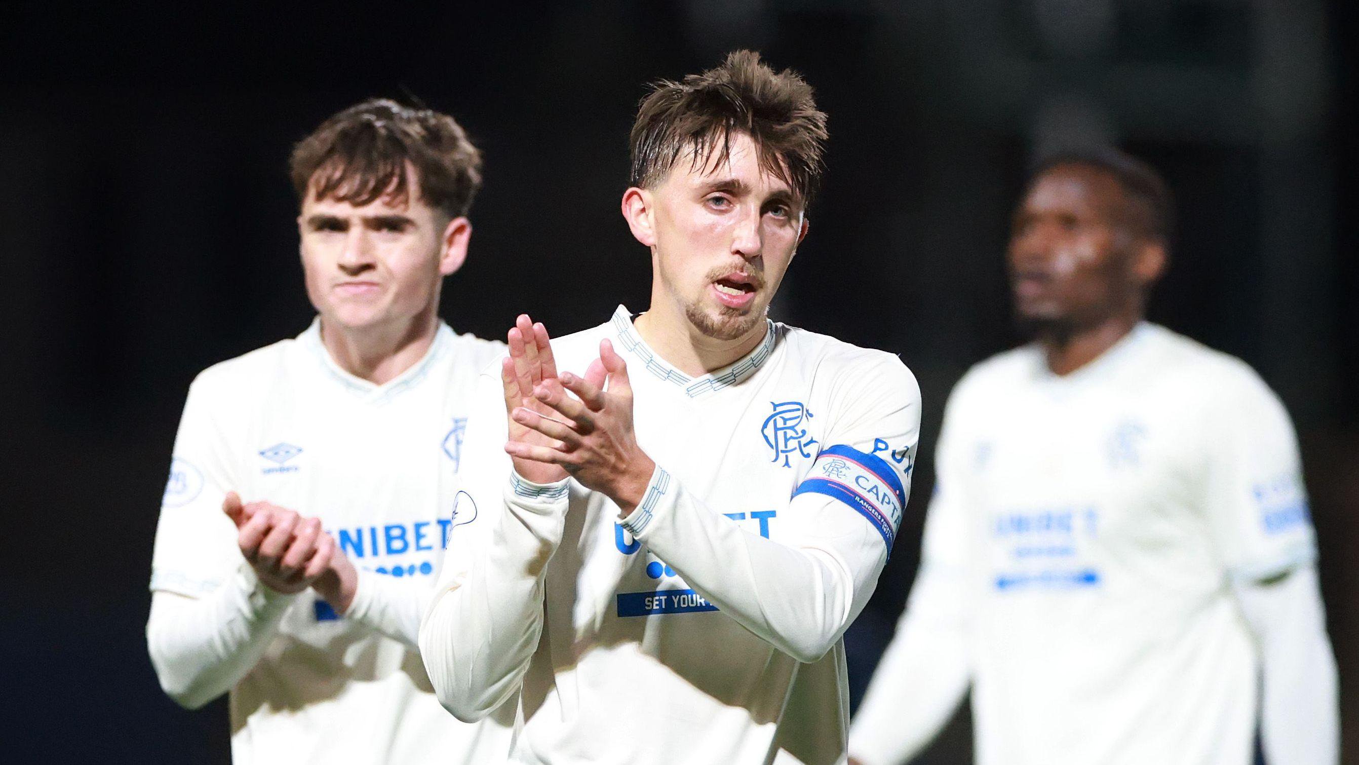 Dan Neil applauds Rangers' fans at Dundee