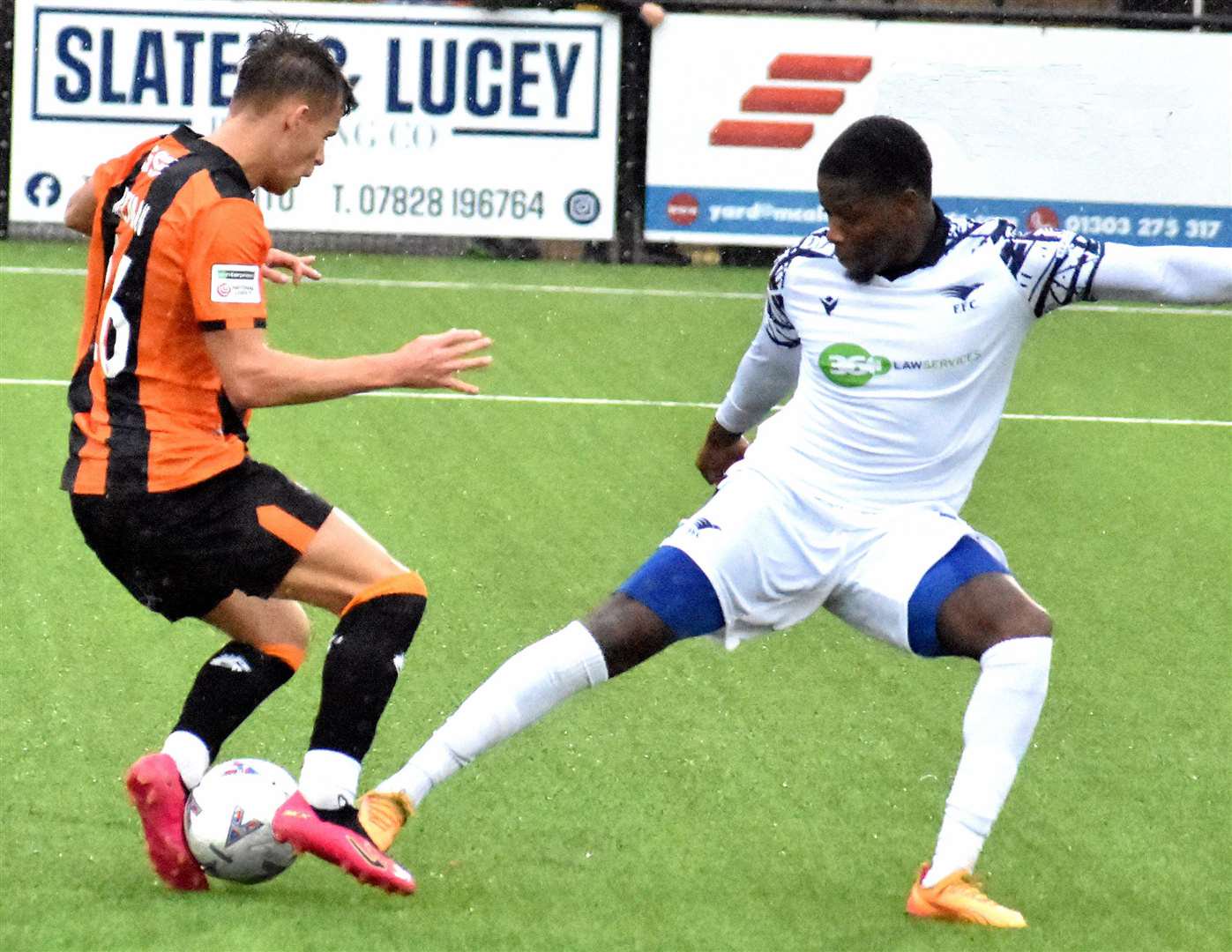 On-loan Folkestone forward Bobby Kelman in the thick of it against Farnborough. Picture: Randolph File