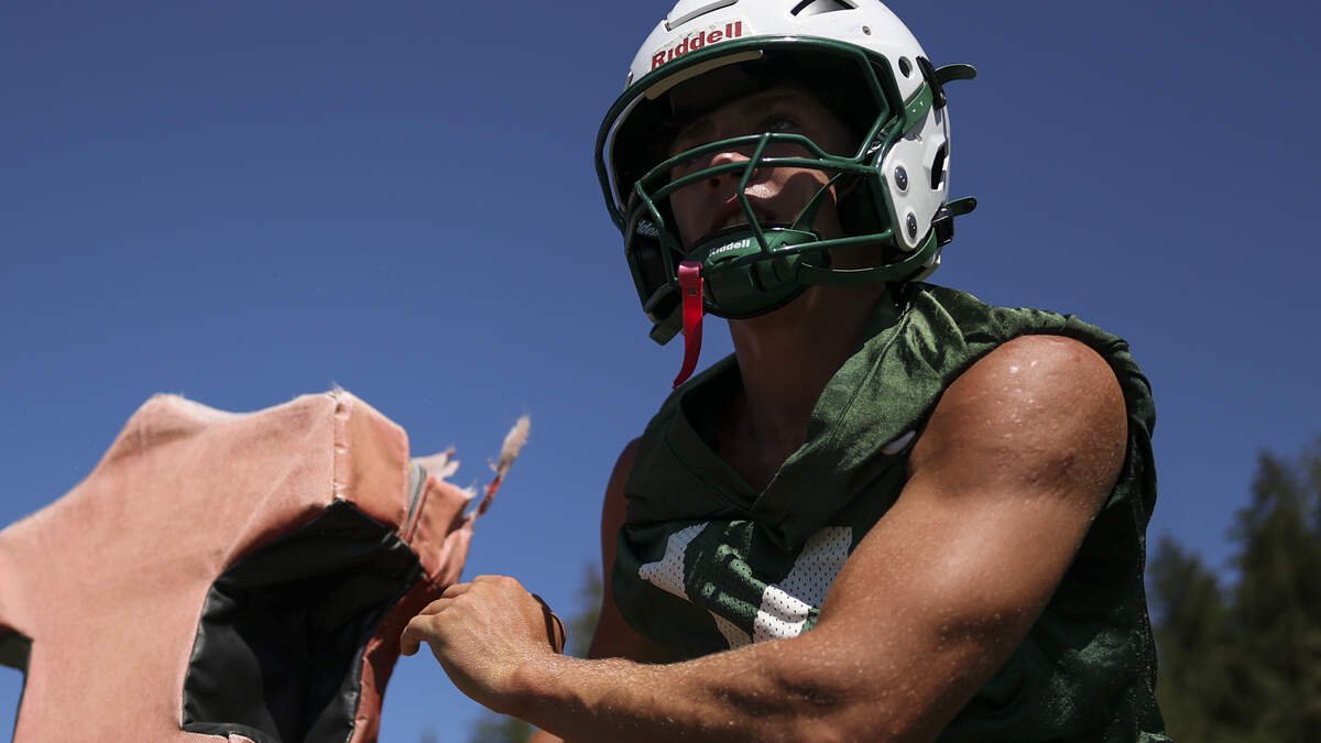 Peninsula’s Thomas Marzano (14) runs drills during football practice at Peninsula High School, on Thursday, Aug. 20, 2026, in Gig Harbor.