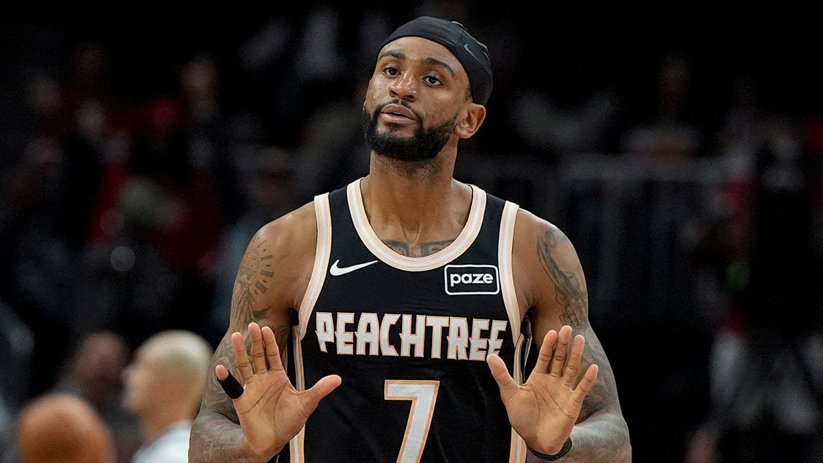 Atlanta Hawks guard Nickeil Alexander-Walker reacts during an NBA game.