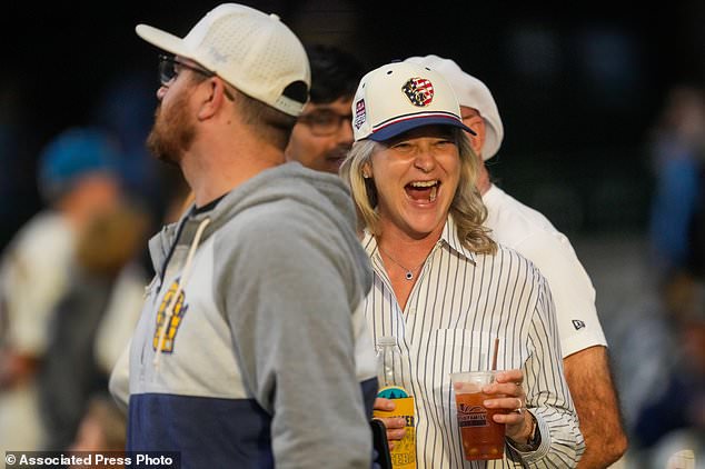 Milwaukee Brewers fans watch batting practice prior to Game 2 of baseball's World Series, Saturday, Oct. 24, 2026, in Milwaukee, between the Milwaukee Brewers and the Tampa Bay Rays. (AP Photo/Ashley Landis)