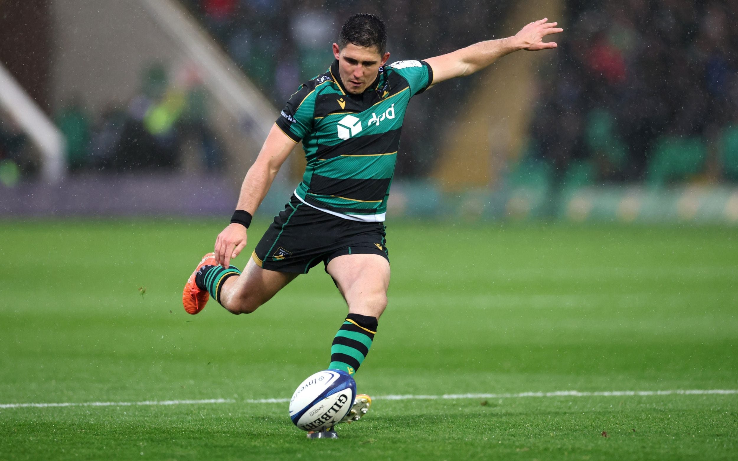 Anthony Belleau of Northampton Saints kicks against Cardiff