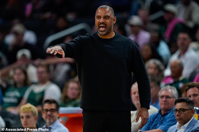 Houston Rockets head coach Ime Udoka yells to his players during the first half of an NBA basketball game against the Milwaukee Bucks Wednesday, Oct. 28, 2026, in Milwaukee. (AP Photo/Kayla Wolf)