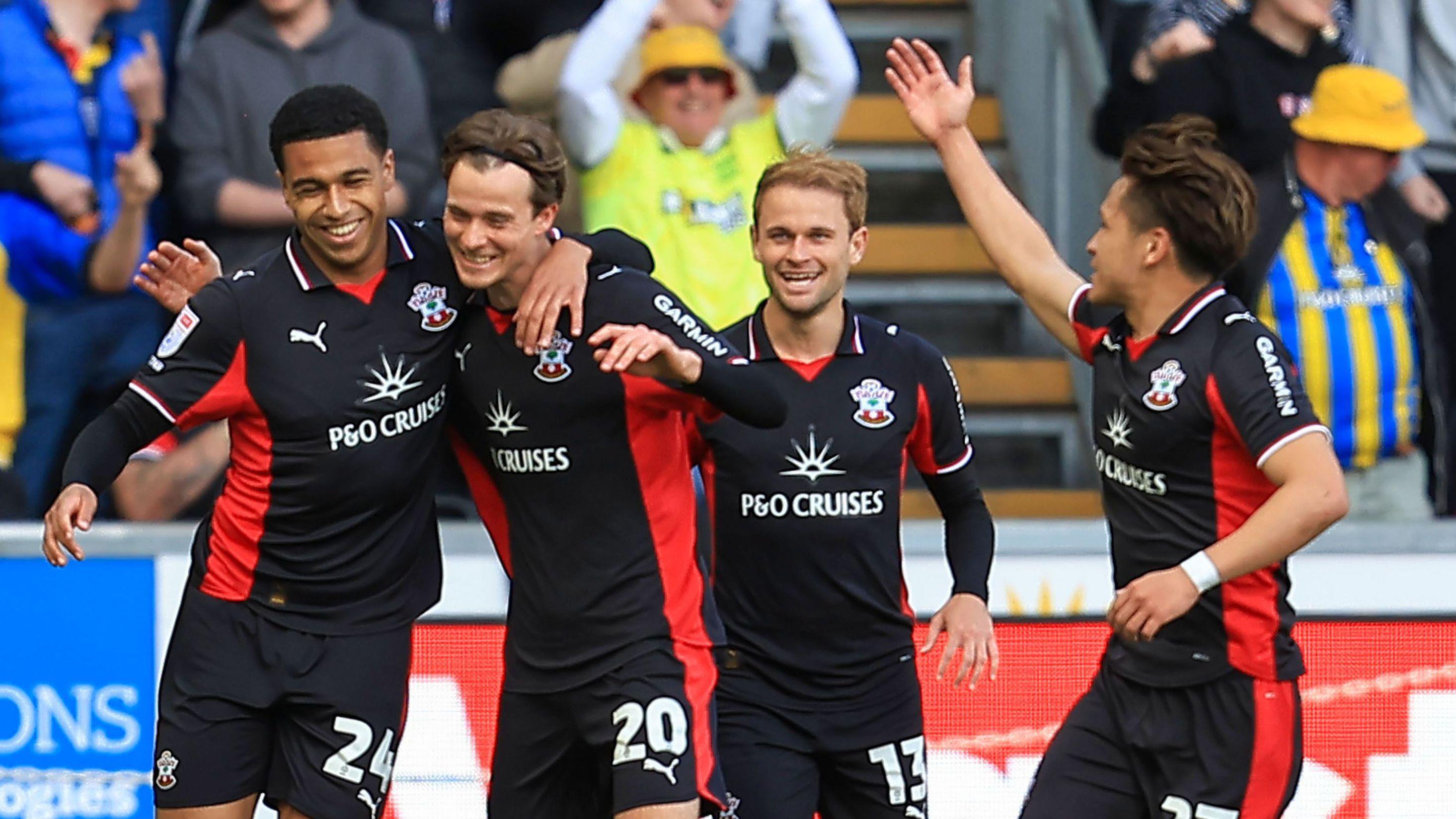 Southampton players celebrate during their win at Swansea in April  