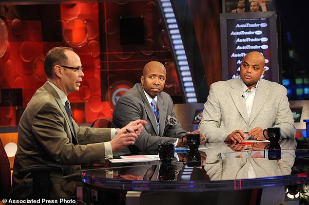 FILE - Inside the NBA host Ernie Johnson Jr., left, and analysts Kenny Smith, center, and Charles Barkley sit on set at the TNT studios in Atlanta, Feb. 4, 2010. (AP Photo/Erik S. Lesser, File)