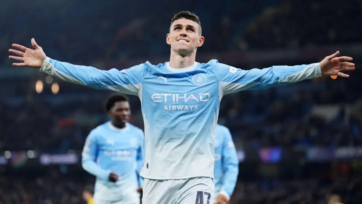Phil Foden celebrates his third goal against AEK Athens in 2026.
