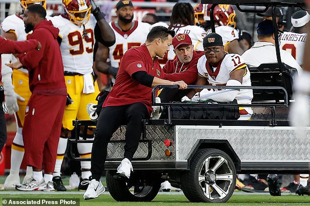 Washington Commanders wide receiver Terry McLaurin (17) is carted off the field during the first half of an NFL football game against the San Francisco 49ers in Santa Clara, Calif., Monday, Oct. 19, 2026. (AP Photo/Kelley L. Cox)