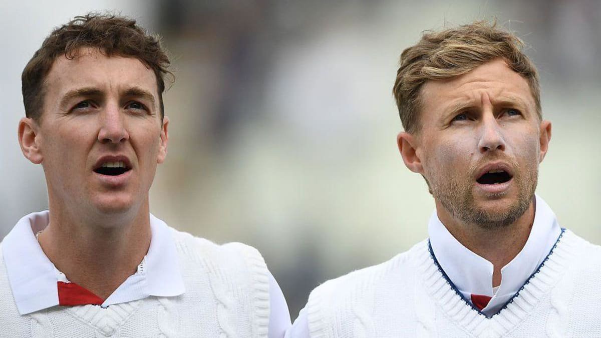 Harry Brook and Joe Root singing the national anthem