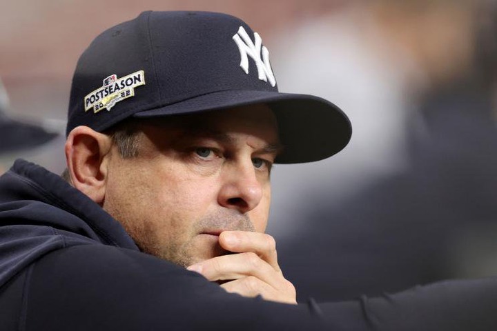 Aaron Boone #17 of the New York Yankees looks on during the second inning against the Houston Astros in game one of the American League Championship Series at Minute Maid Park on October 19, 2022 in Houston, Texas.