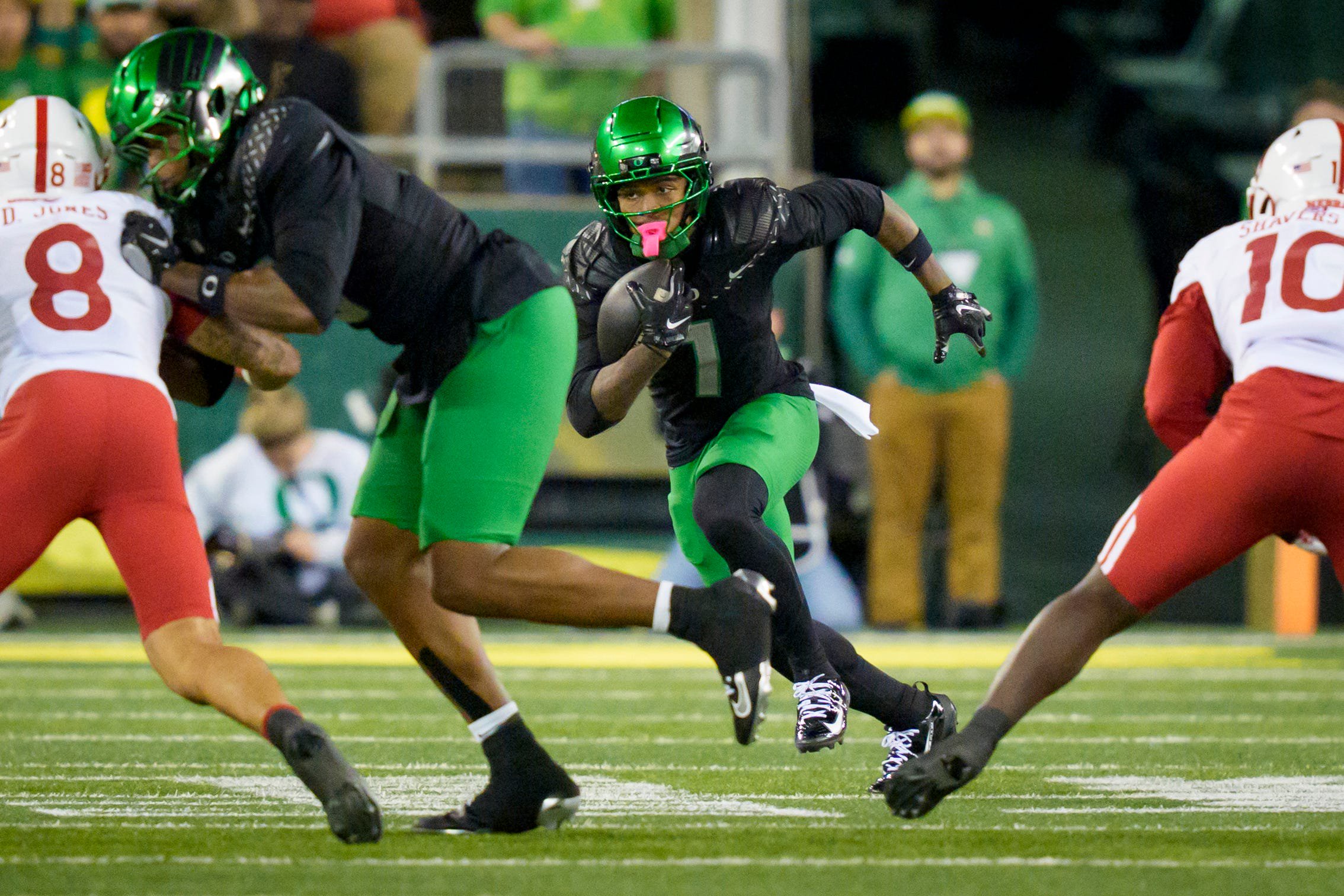 Oregon Ducks wide receiver Dakorien Moore carries the ball as the Oregon Ducks host the Nebraska Cornhuskers on Oct. 17, 2026, at Autzen Stadium in Eugene, Oregon.