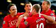 Dimitar Berbatov, Cristiano Ronaldo, Wayne Rooney and Rio Ferdinand celebrate a goal for Manchester United.