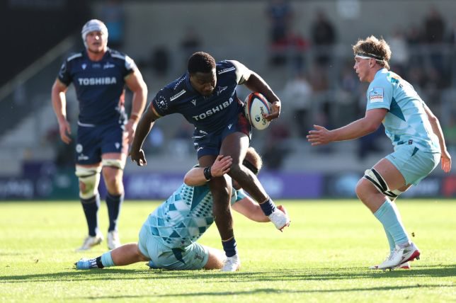 SALFORD, ENGLAND - OCTOBER 11: Nathan Jibulu of Sale Sharks is tackled by Will Hobson of Harlequins during the Gallagher PREM 2026/2027 match between Sale Sharks and Harlequins at CorpAcq Stadium on October 11, 2026 in Salford, England. (Photo by Jan Kruger/Getty Images for Sale Sharks)