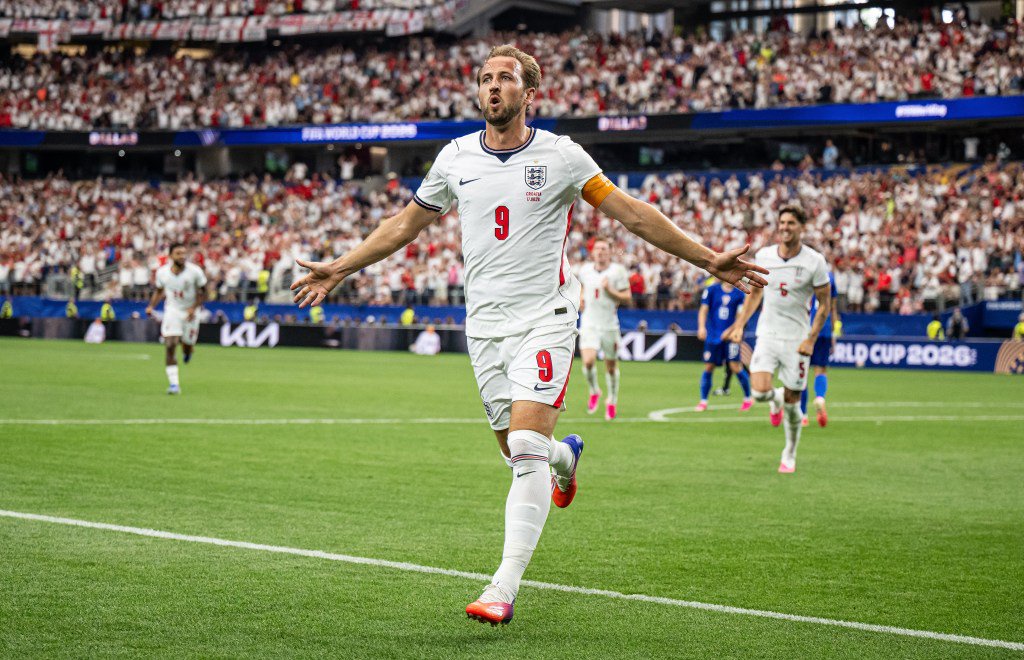 Harry Kane celebrates scoring a goal for England during a match against Croatia.