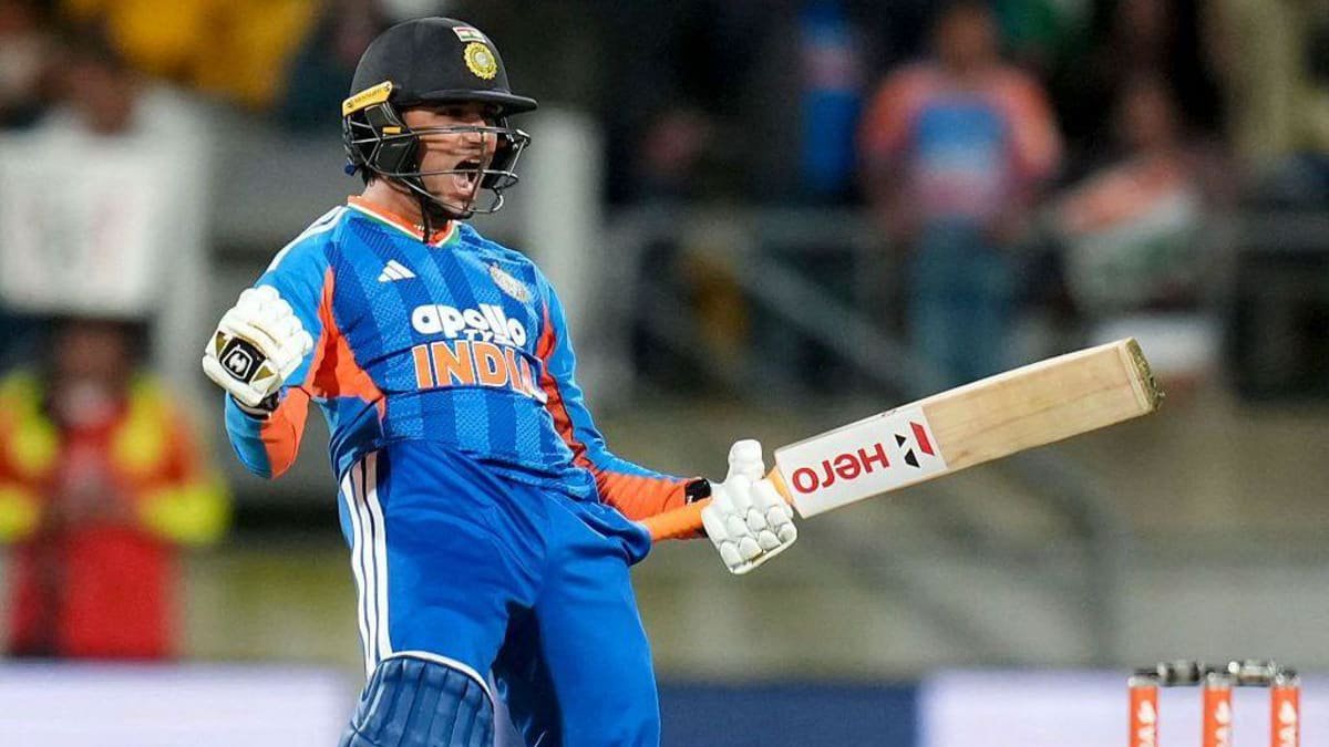 Abhishek Sharma celebrates reaching his century for India v New Zealand