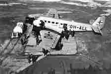 The Junkers Ju 52 aircraft "Kaleva" by the Finnish airline Aero is parked at Helsinki's Malmi Airport in this 1939 photo. With U.S. and French diplomatic couriers aboard, the civilian plane was shot down over the Baltic Sea by Soviet bombers on June 14, 1940 just days before Moscow annexed the three Baltic states. The mysterious case which claimed the lives of nine people is being solved after 84 years as an Estonian diving group has located the aircraft's wreckage off a tiny island close to Tallinn. (Finnish Aviation Museum via AP)
