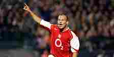 Freddie Ljungberg celebrating an Arsenal goal by pointing to the sky