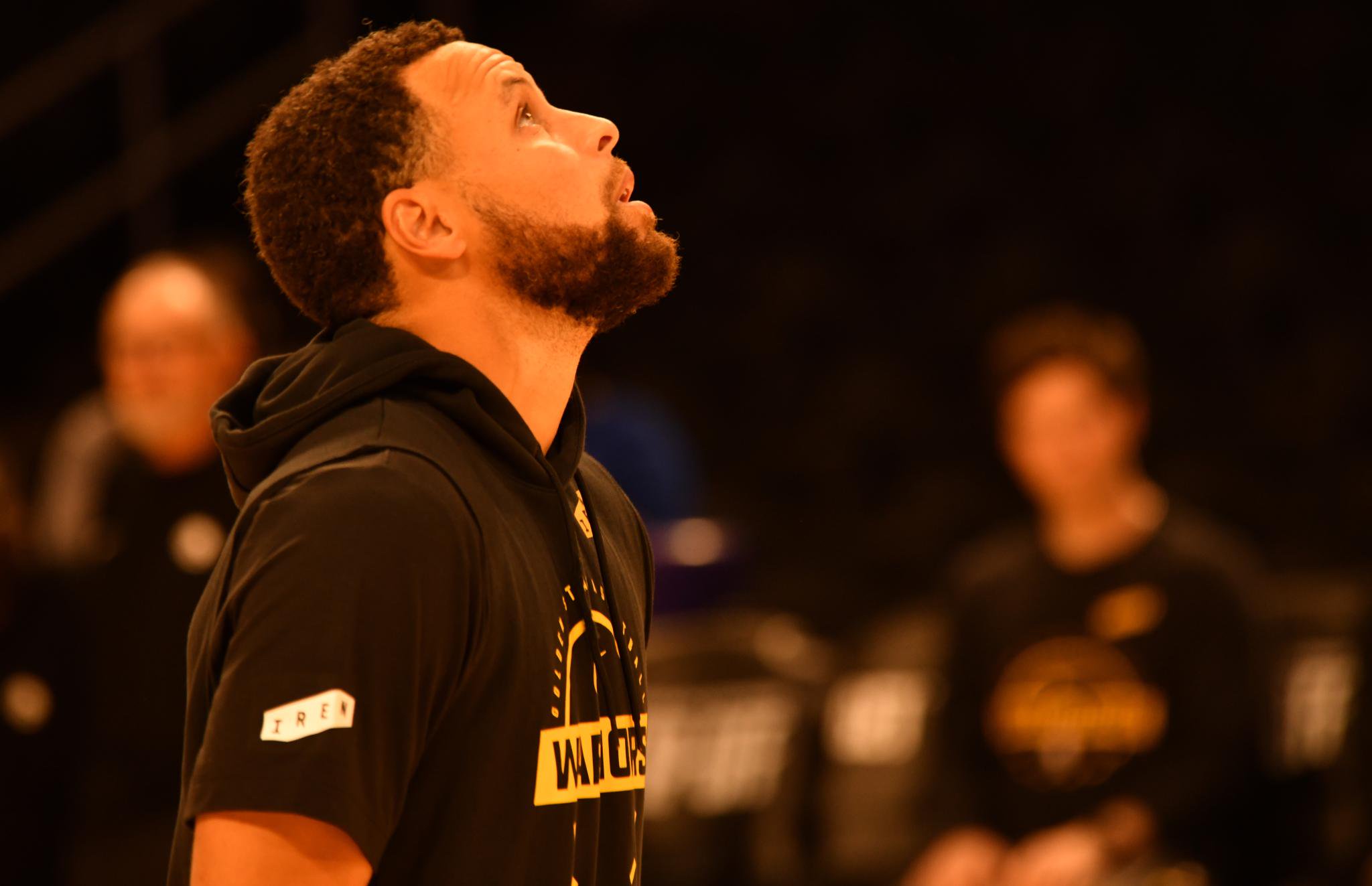 Steph Curry looks up during warmups at the arena.