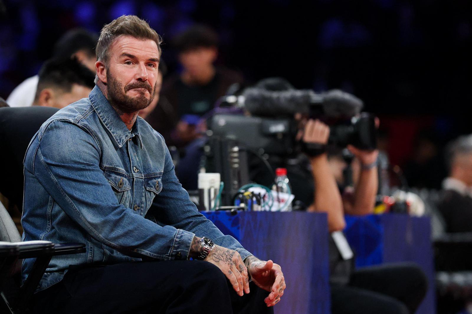 MACAU, CHINA - OCTOBER 11: David Beckham looks on during NBA China Games 2026 between Dallas Mavericks and Houston Rockets at The Venetian Arena on the Cotai Strip on October 11, 2026 in Macau, China. NOTE TO USER: User expressly acknowledges and agrees that, by downloading and or using this photograph, User is consenting to the terms and conditions of the Getty Images License Agreement.   Zhizhao Wu/Getty Images/AFP (Photo by Zhizhao Wu / GETTY IMAGES NORTH AMERICA / AFP)