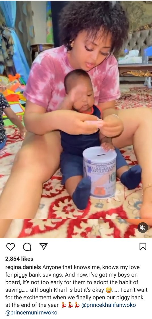 Regina Daniels shows off wads of new notes her sons are saving in their piggy bank