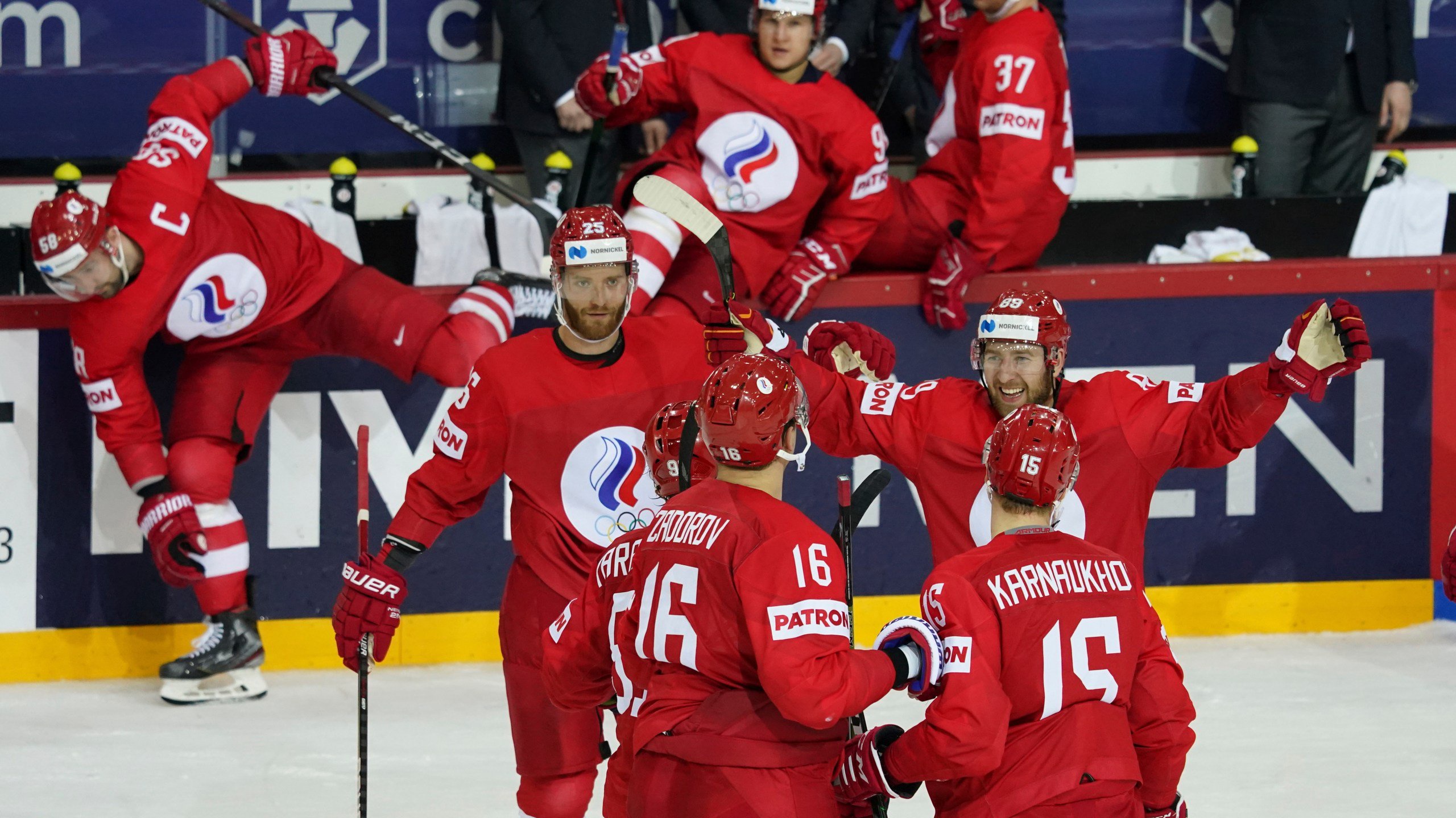 FILE - Russia players celebrate during the Ice Hockey World Championship group A match between the Russia and Sweden in Riga, Latvia, May 31, 2021. (AP Photo/Roman Koksarov, File)