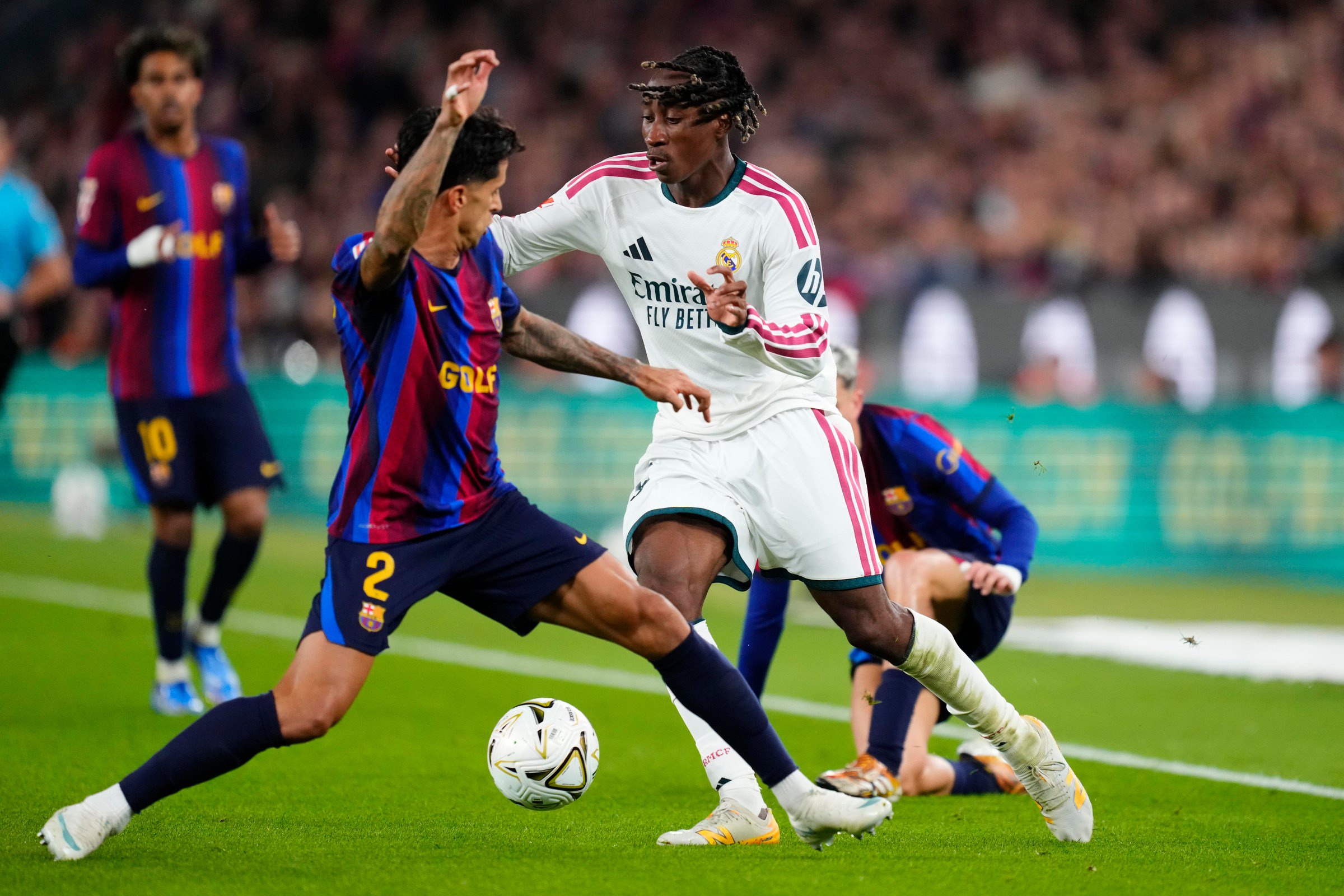 Yan Diomande right winger of Real Madrid and Cote d’Ivoire and Joao Cancelo right-back of Barcelona and Portugal compete for the ball during the LaLiga EA Sports 2026/27 match between FC Barcelona and Real Madrid at Spotify Camp Nou on October 25, 2026 in Barcelona, Spain. (Photo by Jose Breton/Pics Action/NurPhoto via Getty Images)