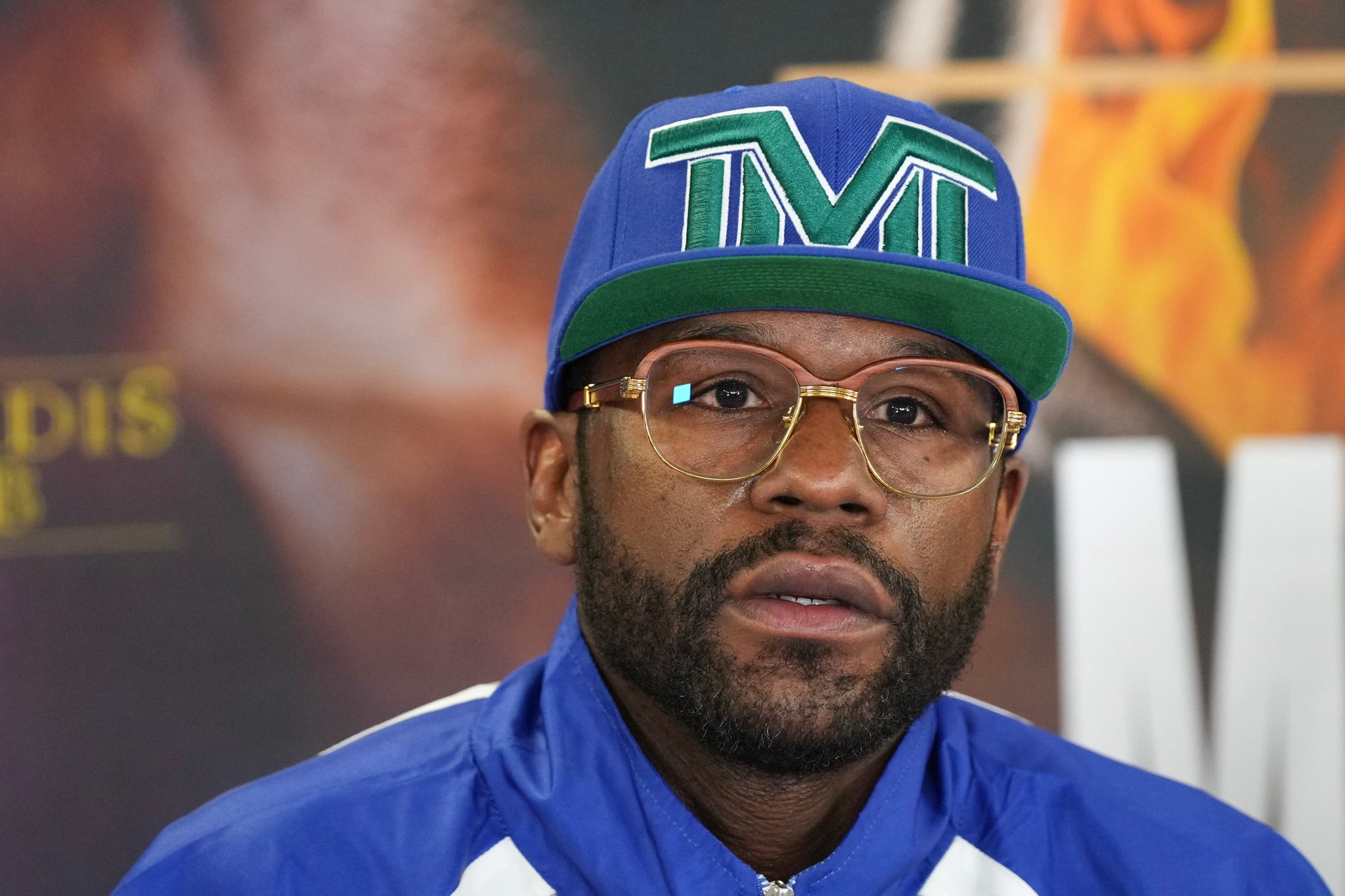 Floyd Mayweather talking at a press conference