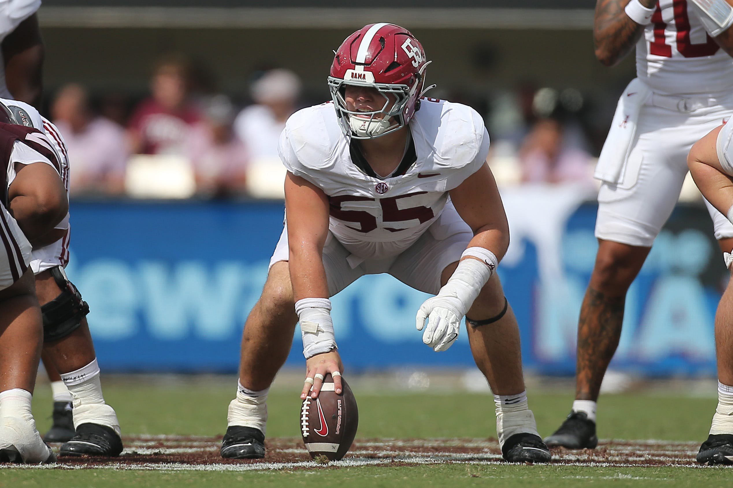 Oct 3, 2026; Starkville, Mississippi, USA; Alabama Crimson Tide offensive lineman Racin Delgatty (55) prepares to snap the ball during the fourth quarter against the Mississippi State Bulldogs at Davis Wade Stadium at Scott Field. Mandatory Credit: Petre Thomas-Imagn Images