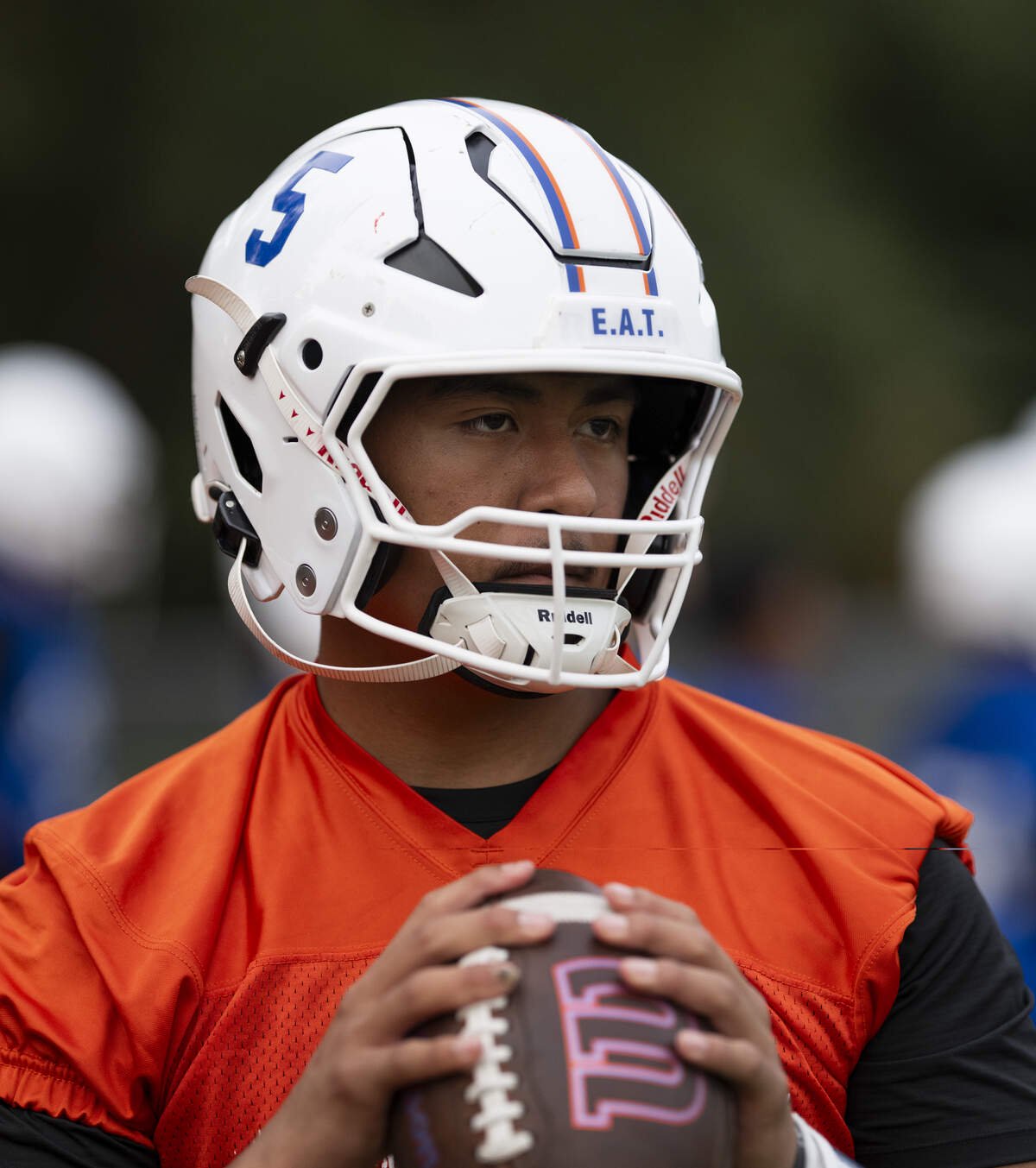 Graham-Kapowsin quarterback AJ Tuivaiave runs drills during football practice at Graham-Kapowsin High School, on Friday, Aug. 21, 2026, in Graham.