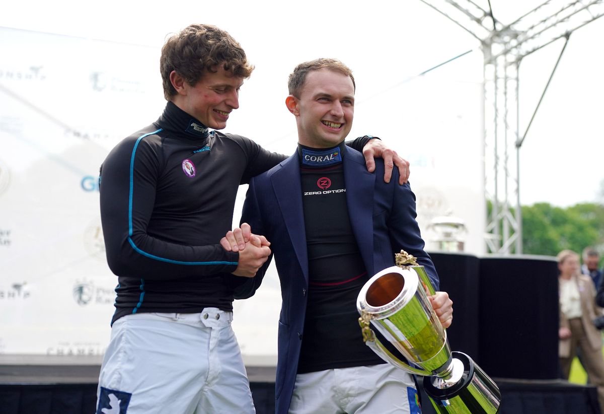 Sean Bowen with the Champion Jockey trophy at Sandown Park Racecourse