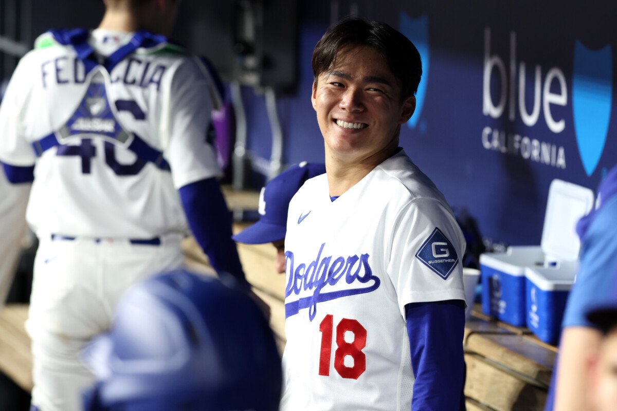 Sep 9, 2026; Los Angeles, California, USA; Los Angeles Dodgers pitcher Yoshinobu Yamamoto (18) looks on during the third inning against the Cincinnati Reds at Dodger Stadium. Mandatory Credit: Kiyoshi Mio-Imagn Images
