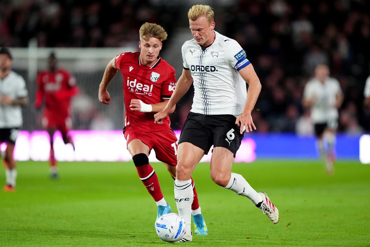 West Bromwich Albion's Jimmy Jay-Morgan (left) and Derby County's Sondre Langas battle for the ball 