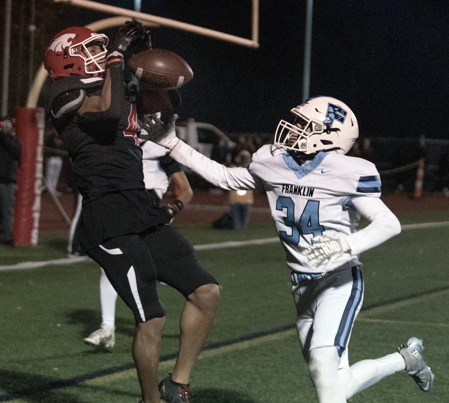 Franklin junior Jacoby Brown breaks up a pass against Milton junior Taj Chung at Brooks Field in Milton, Oct. 23, 2026.