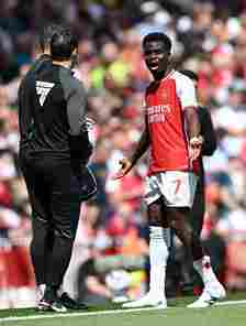 Bukayo Saka gestures after a tackle during Arsenal vs AFC Bournemouth