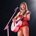 Taylor Swift debuts red and yellow outfit with Chiefs' Travis Kelce in the audience for 87th 'Eras Tour' show
