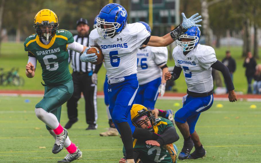 Leo McFarland tries to break a tackle.