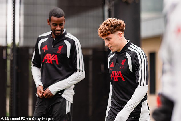 Munoz (pictured at Liverpool's AXA training centre with Alexander Isak) is said to have settled in well at his new club