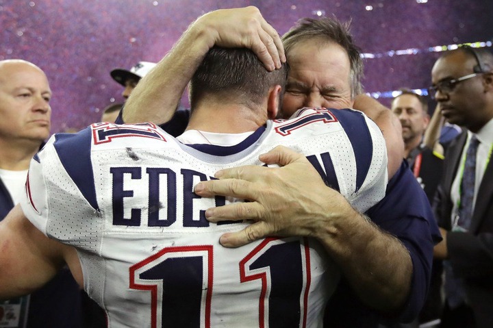Julian Edelman and Bill Belichick embrace following a Patriots Super Bowl win in February 2017.