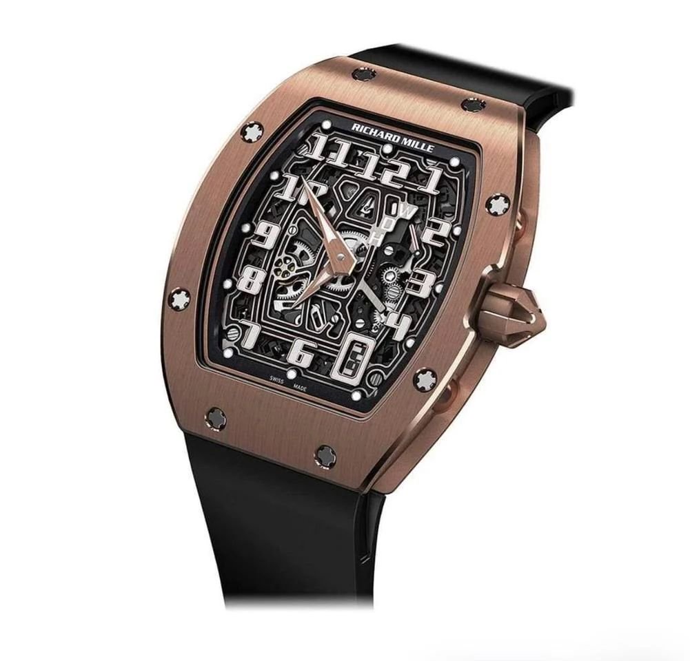 Image may contain Wristwatch Arm Body Part and Person