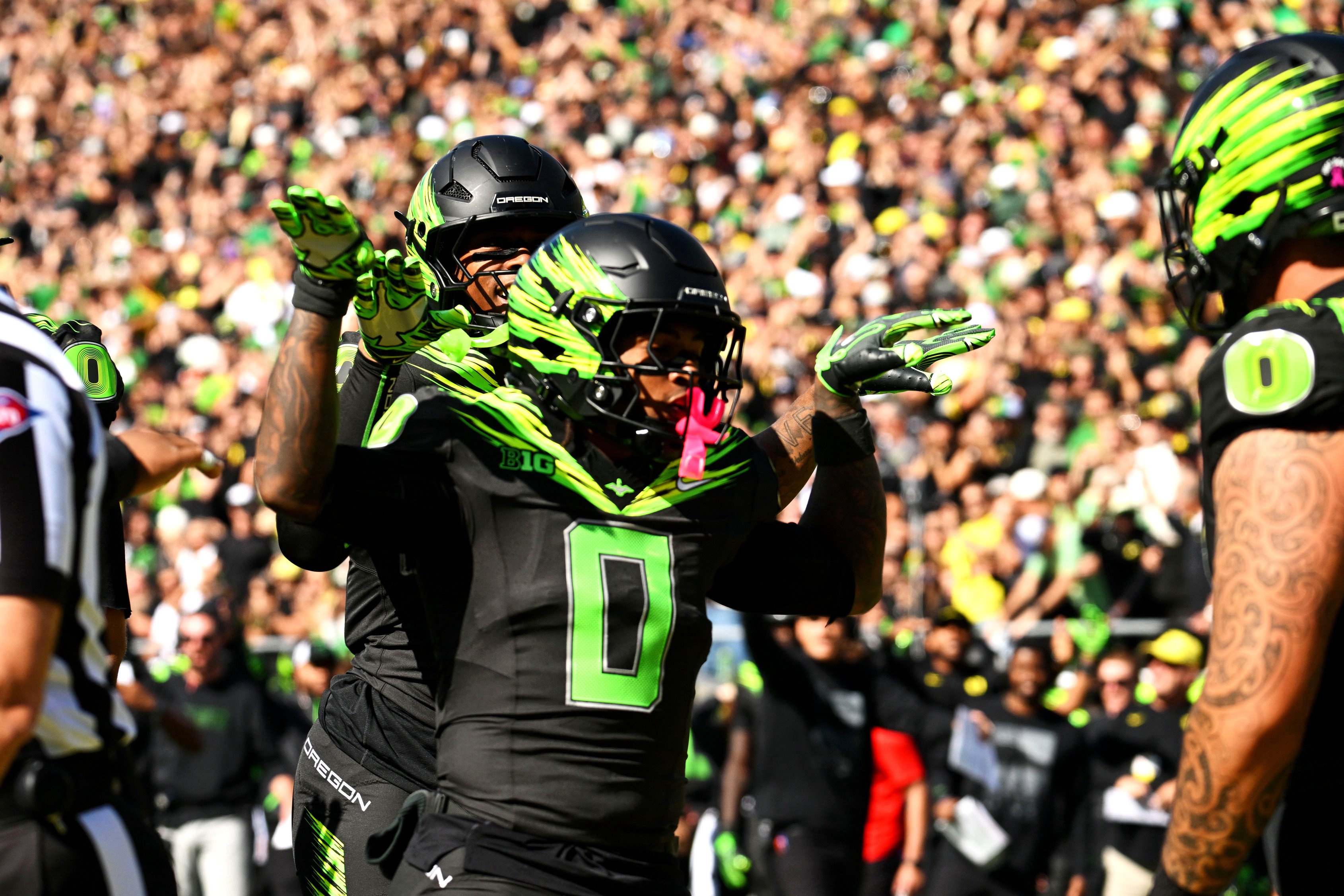 Oct 10, 2026; Eugene, Oregon, USA;  Oregon Ducks running back Jordon Davison (0) scores a touchdown during the first quarter against the UCLA Bruins at Autzen Stadium.  Mandatory Credit: Troy Wayrynen-Imagn Images