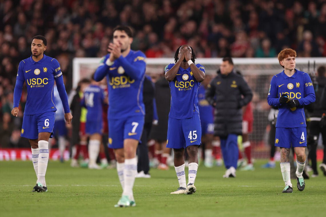 Levi Colwill, Romeo Lavia and Valentin Barco of Chelsea react after the Carabao Cup Fourth Round match between Liverpool and Chelsea at Anfield