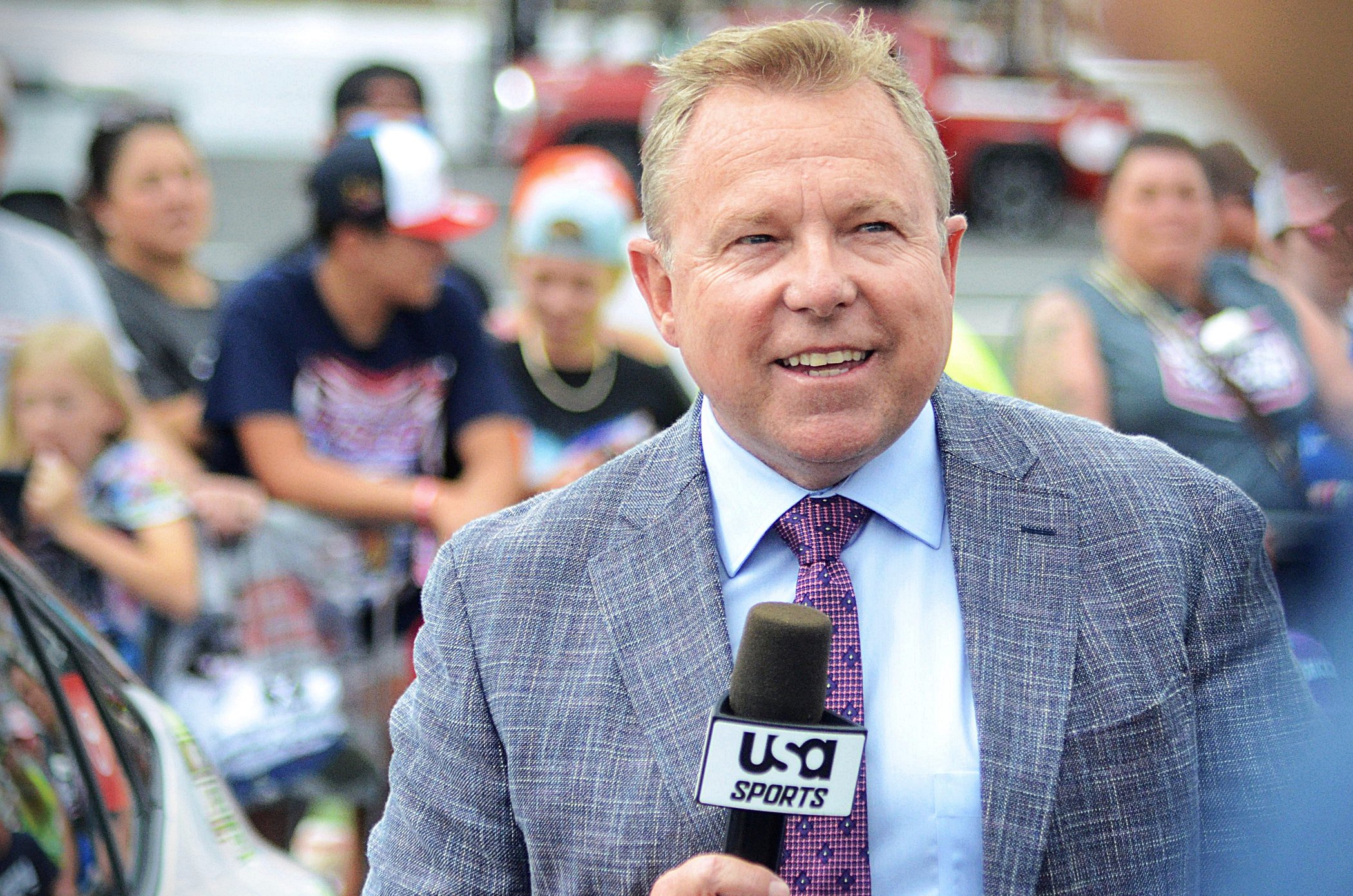 Play-by-play broadcaster Leigh Diffey does a pre-race show segment from pit road for USA Sports ahead of the Bank of America 400 at Charlotte Motor Speedway on Sunday, Oct. 11, 2026.