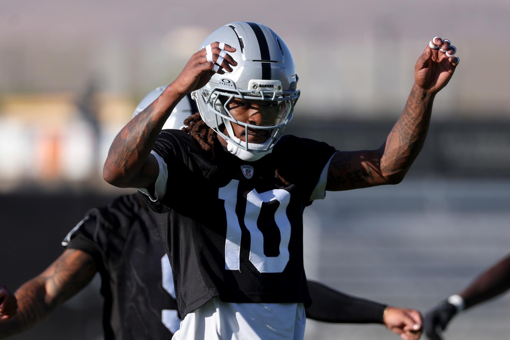 Dont'e Thornton Jr. of the Las Vegas Raiders stretches during the team's training camp.