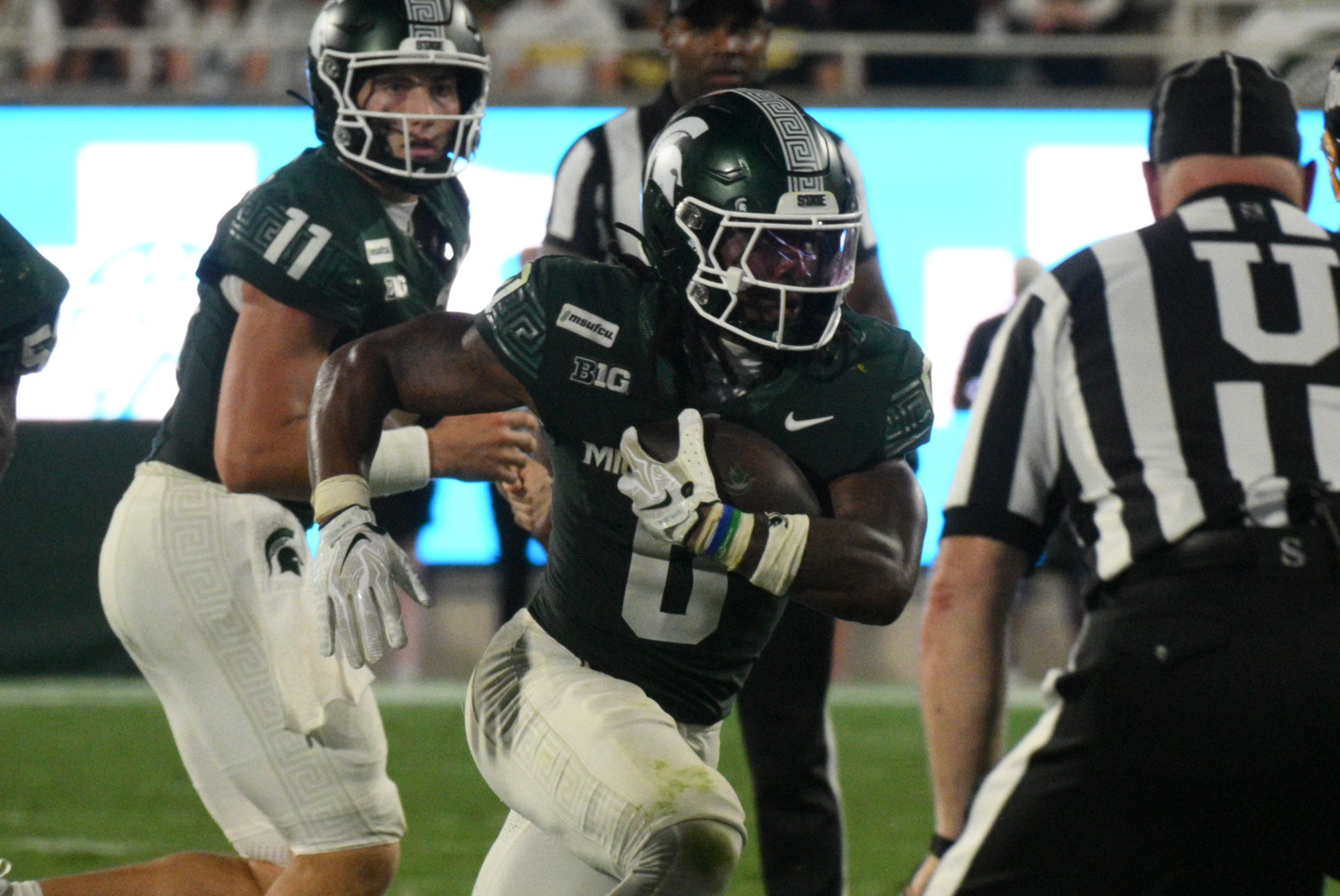 Sep 4, 2026; East Lansing, Michigan, USA;  Michigan State Spartans running back Cam Edwards (0) runs with the ball during the game against the Toledo Rockets at Spartan Stadium.  Mandatory Credit: Dale Young-Imagn Images
