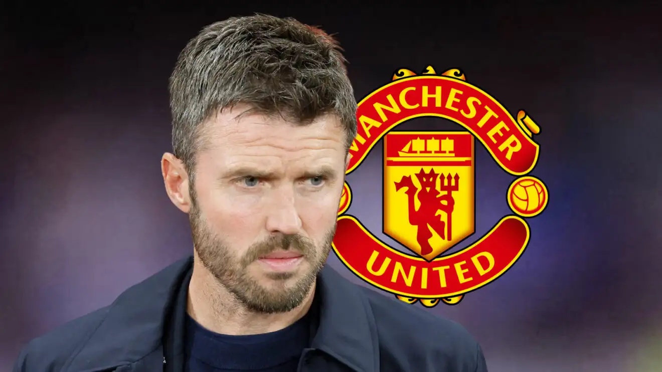 Manchester United manager Michael Carrick next to the Manchester United badge - copyright F365